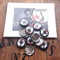 Badges from Big Mel’s Barbershop